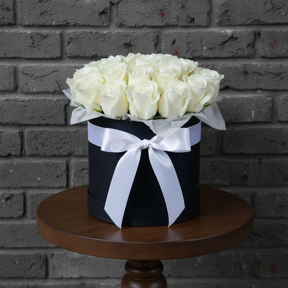 Цветочная композиция из Розы в шляпной коробке в Хилоке